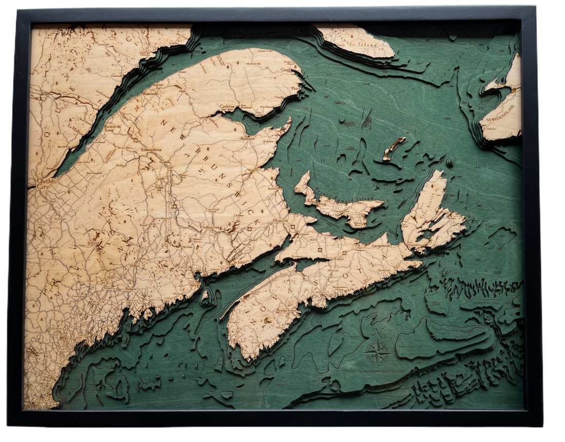 Canadian Maritimes 3D wood wall map in a dark frame, layered Baltic birch cut to real depth data