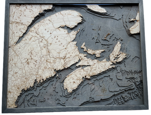 Canadian Maritimes 3D wood wall map in a grey frame, angled view showing the laser-cut depth layers