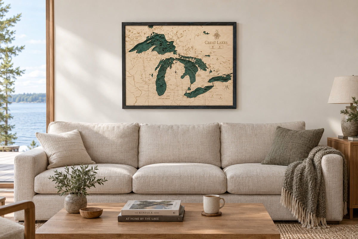 Great Lakes layered wood map, 78.7 by 62.2 cm, hanging above a three-seat sofa in a cottage living room