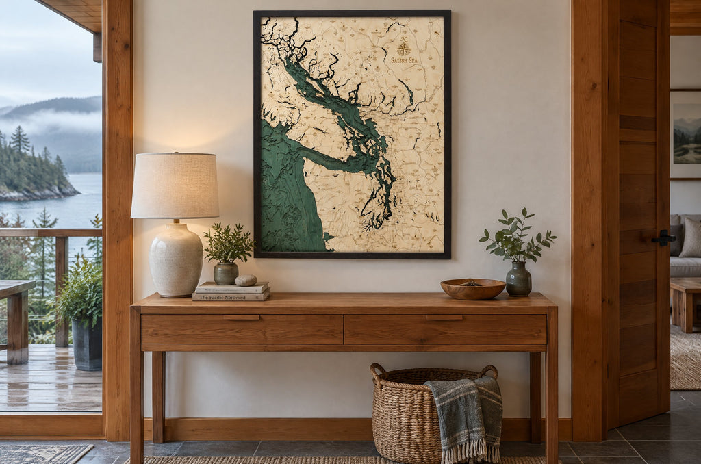 Salish Sea layered wood map hanging above a wooden console table in a West Coast entryway